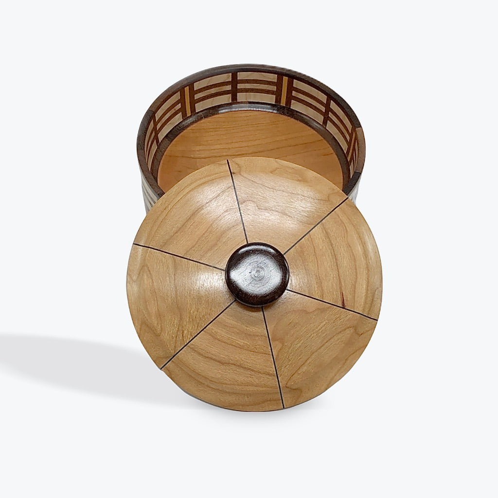 Segmented Cherry Wood Bowl With Maple And Walnut Pattern