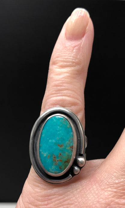 Evans turquoise ring, oval shaped cab, rustic sterling silver hammered band, hanni gallery