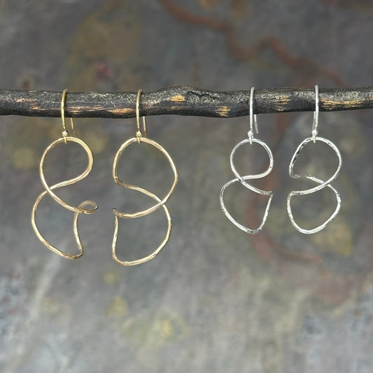 Twisty spiral wire earring in sterling silver or 14kt gold filled, Simple modern dangle in four sizes 1 to 2 inches long, available on french hook or leverback ear wires, artist handmade by hanni jewelry in harbor springs, michigan