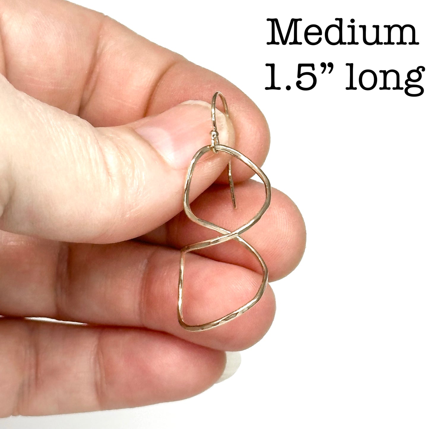 Twisty spiral wire earring medium size in sterling silver or 14kt gold filled, Simple modern dangle in four sizes 1 to 2 inches long, available on french hook or leverback ear wires, artist handmade by hanni jewelry in harbor springs, michigan