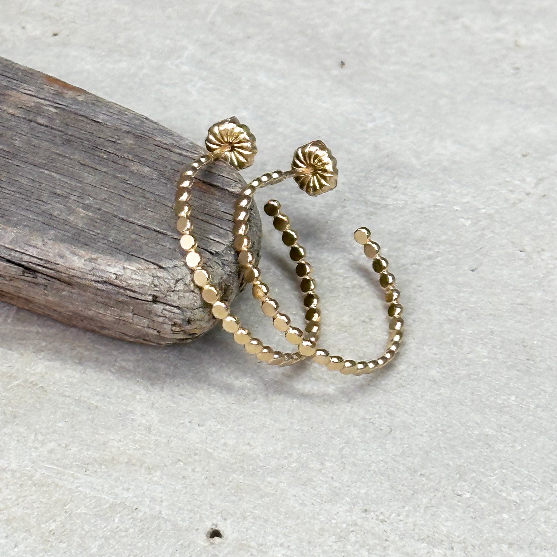 Gold flat bead post hoop earring in different sizes with push back, lightweight delicate hoop earring. Handmade gold jewelry by hanni jewelry, harbor springs, michigan