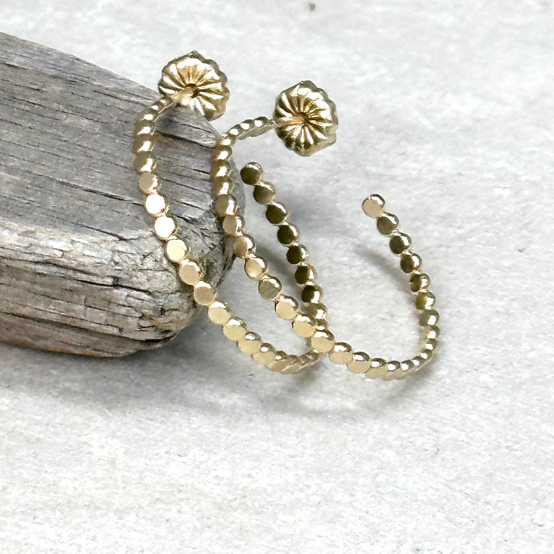 Gold flat bead post hoop earring in different sizes with push back, lightweight delicate hoop earring. Handmade gold jewelry by hanni jewelry, harbor springs, michigan