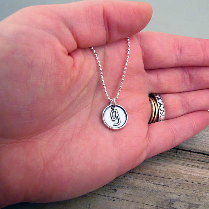 letter initial necklace in silver artisan handmade jewelry by hanni harbor springs michigan